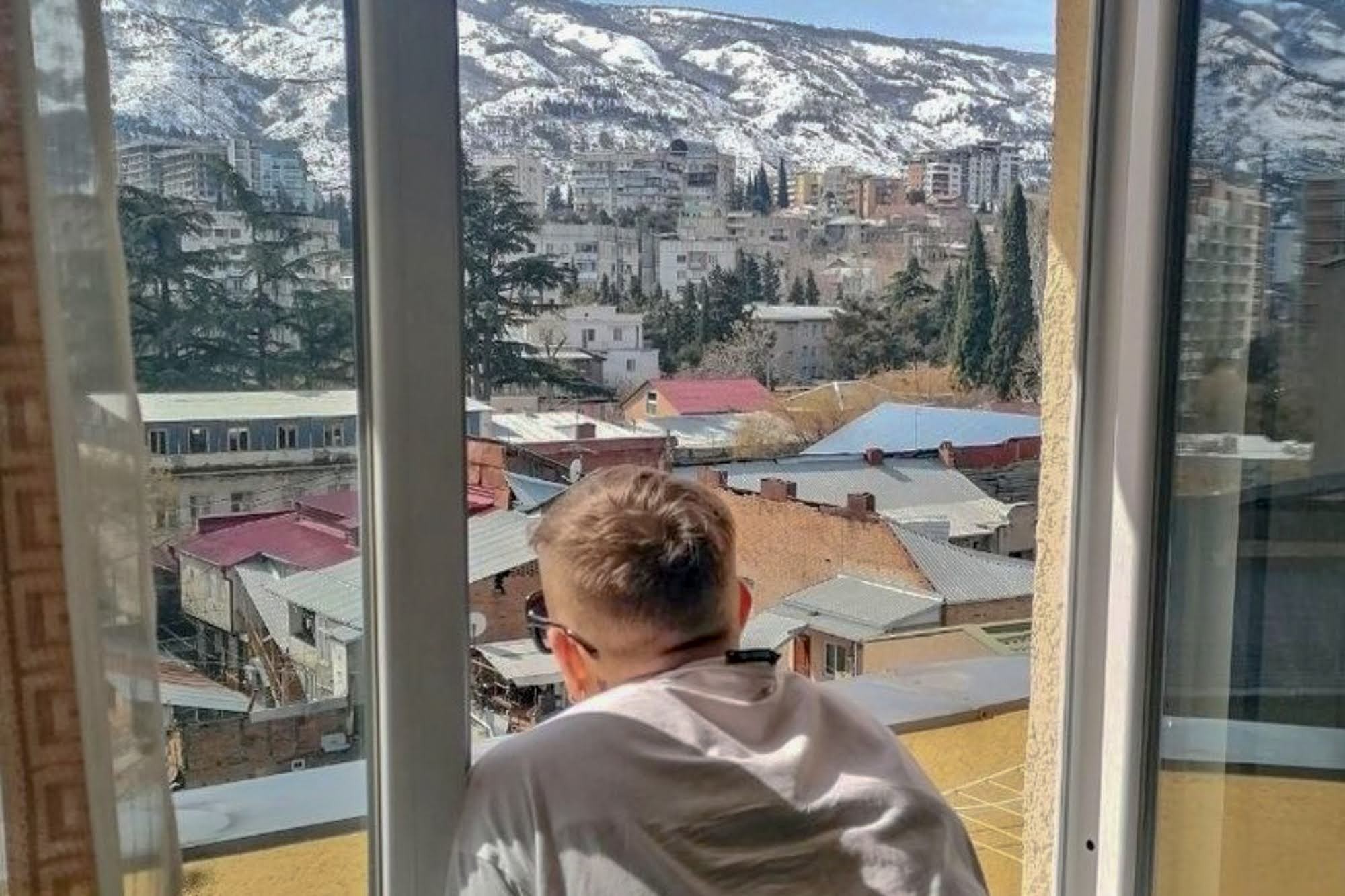 A Russian looks out on Tbilisi. Photo courtesy of @m_a_r_1_s/Twitter.