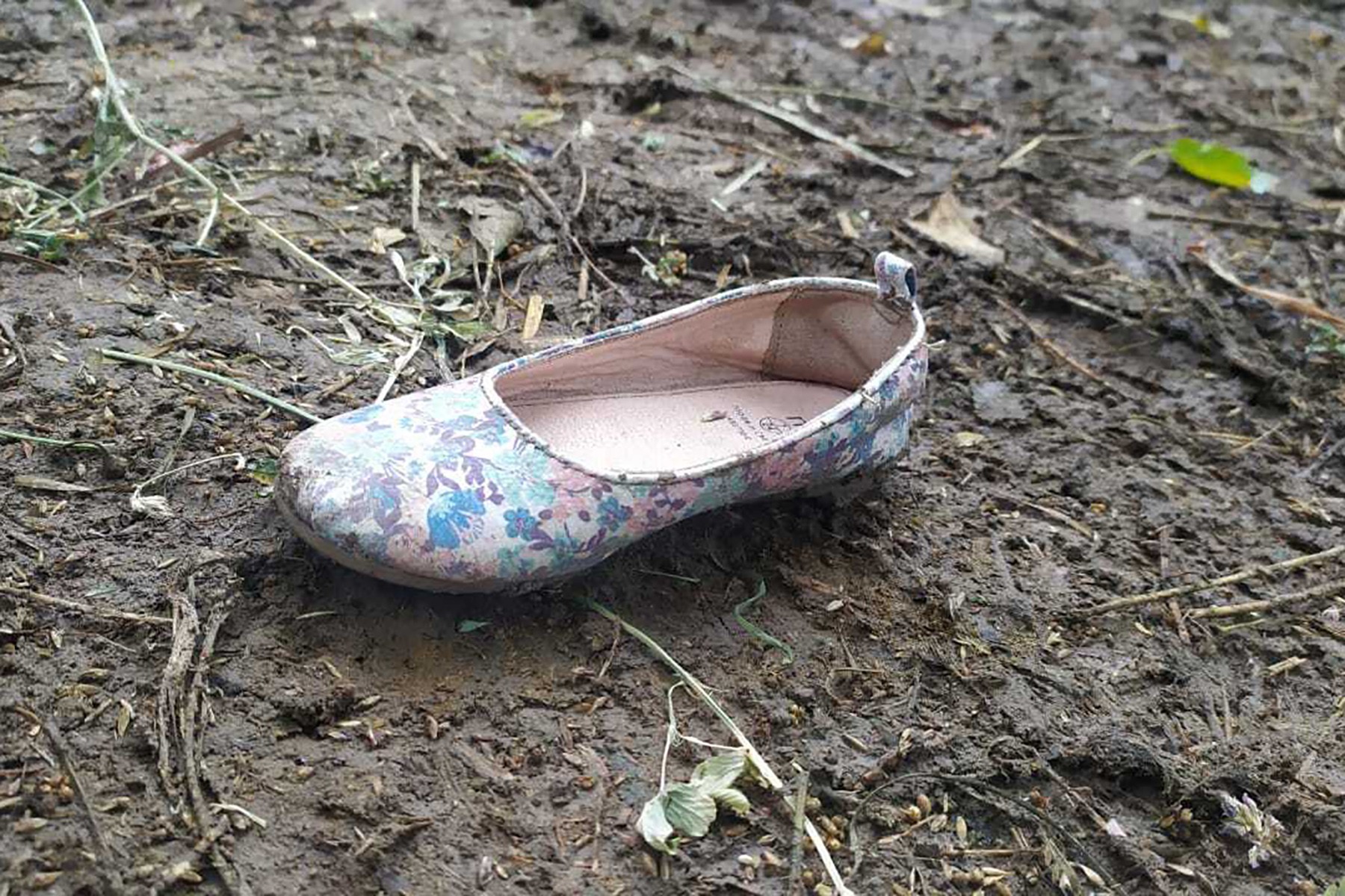 A child's shoe left in the mud in a village that suffered numerous missile strikes during the Second Nagorno-Karabakh War. Photo; Parvana Rahimova.