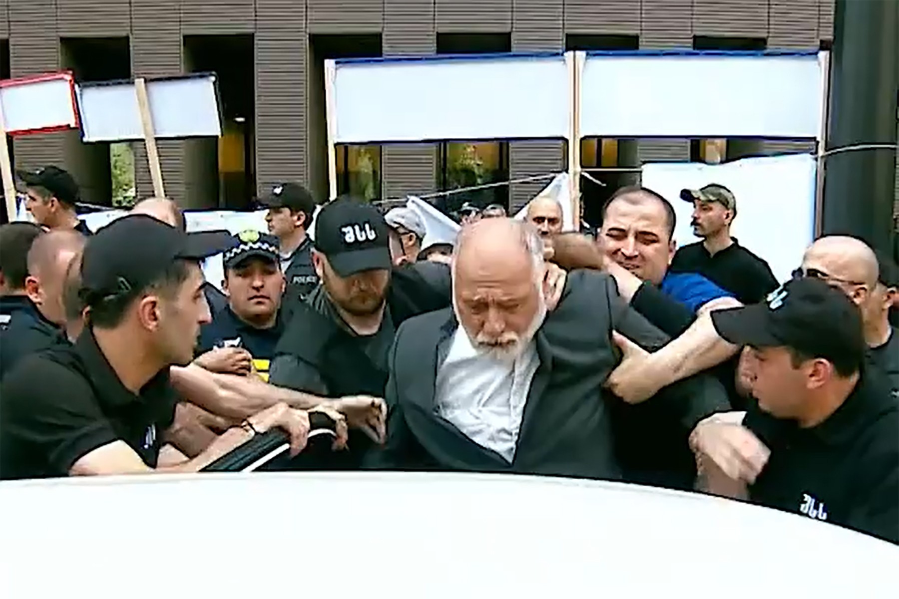 Guram Palavandishvili being arrested at a homophobic protest on 6 June. Image via Mtavari. 