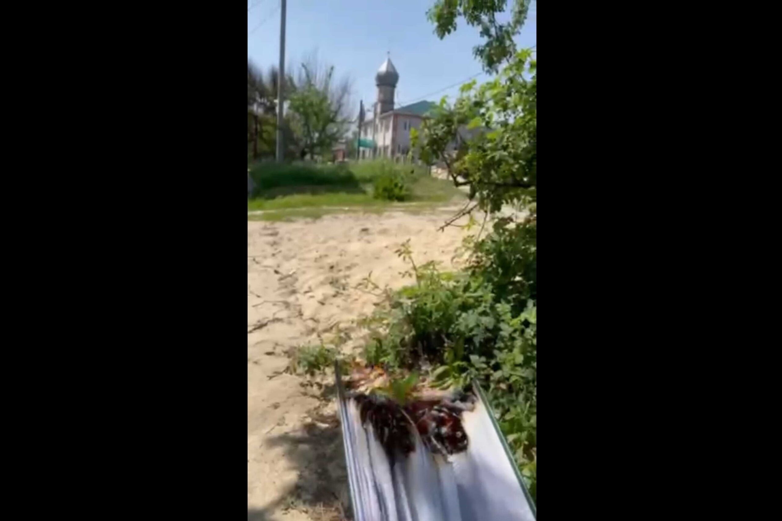 A still from the video of the Quran being burnt near Volgograd's Cathedral Mosque. Screengrab from Telegram