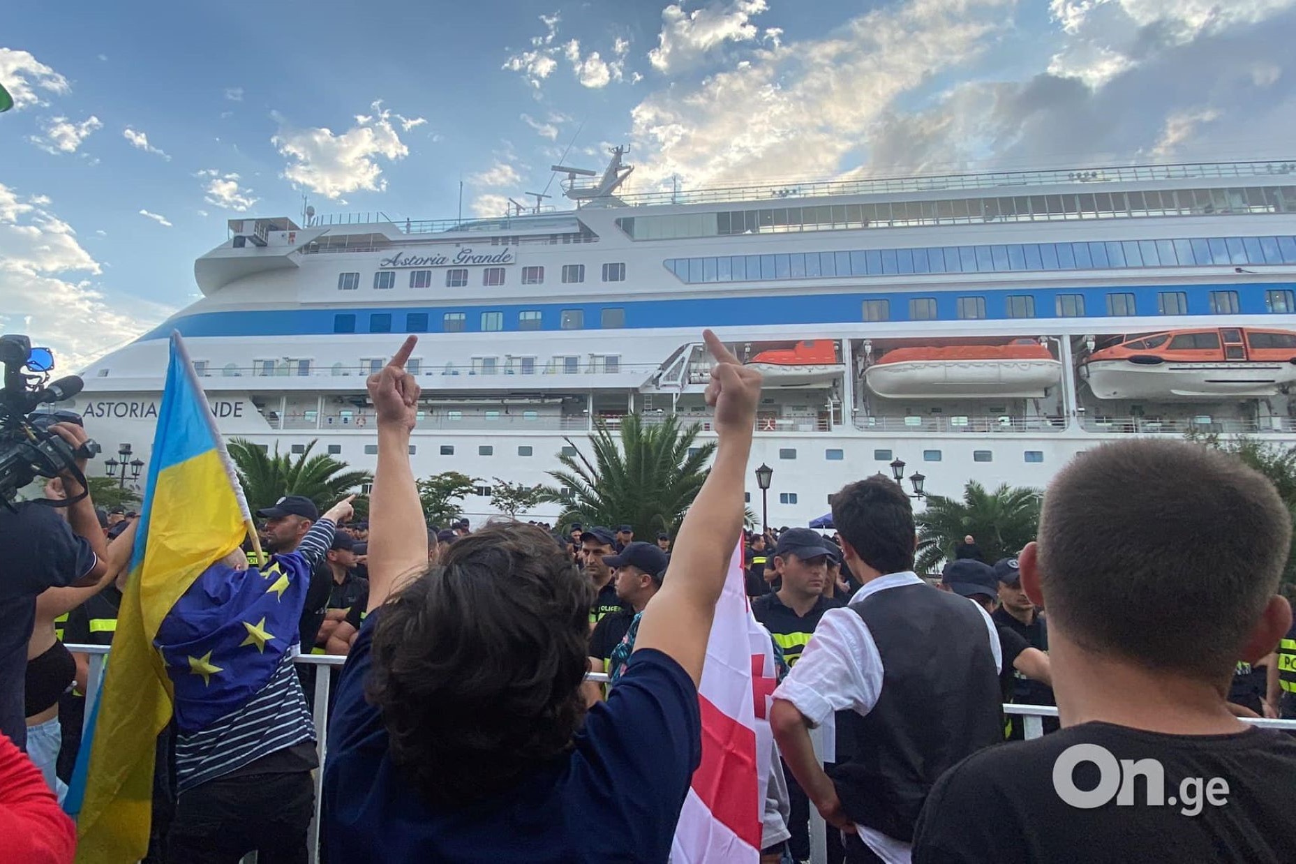 Protesters greet the Astoria Grande at the port of Batumi. Photo: On.ge.