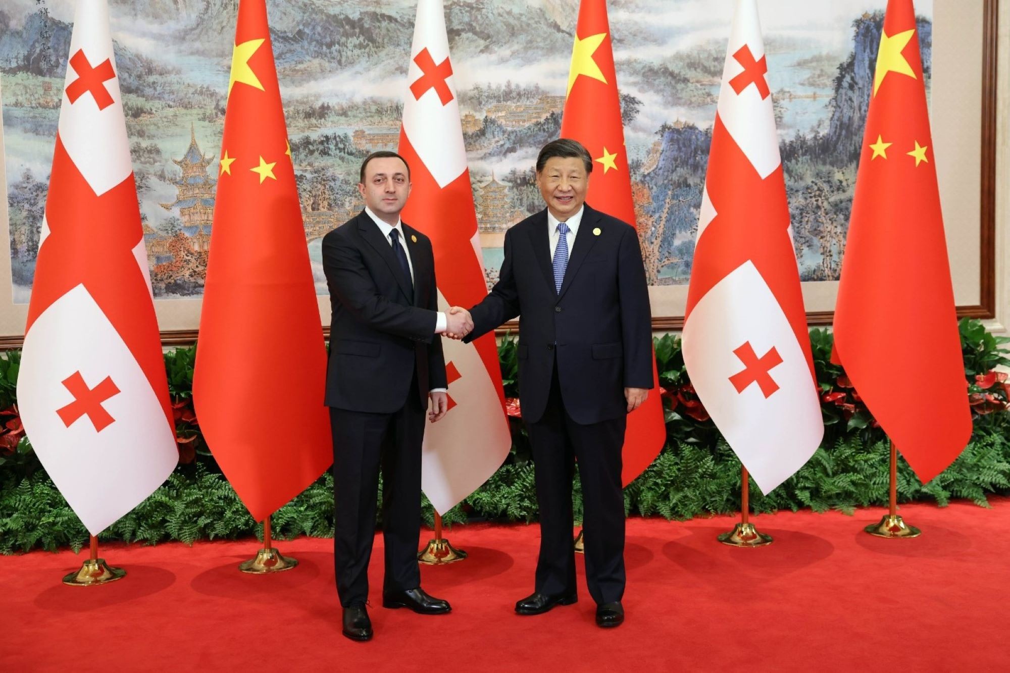 Georgian Prime Minster Irakli Gharibashvili and Chinese Premier Xi Jinping during a visit by the Georgian PM to China. Official photo.