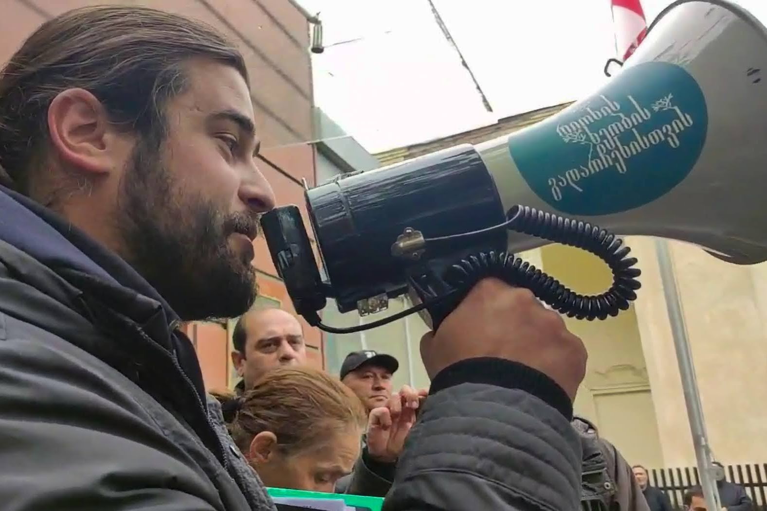 Varlam Goletiani outside Oni city hall. Screengrab from a Facebook live video. 