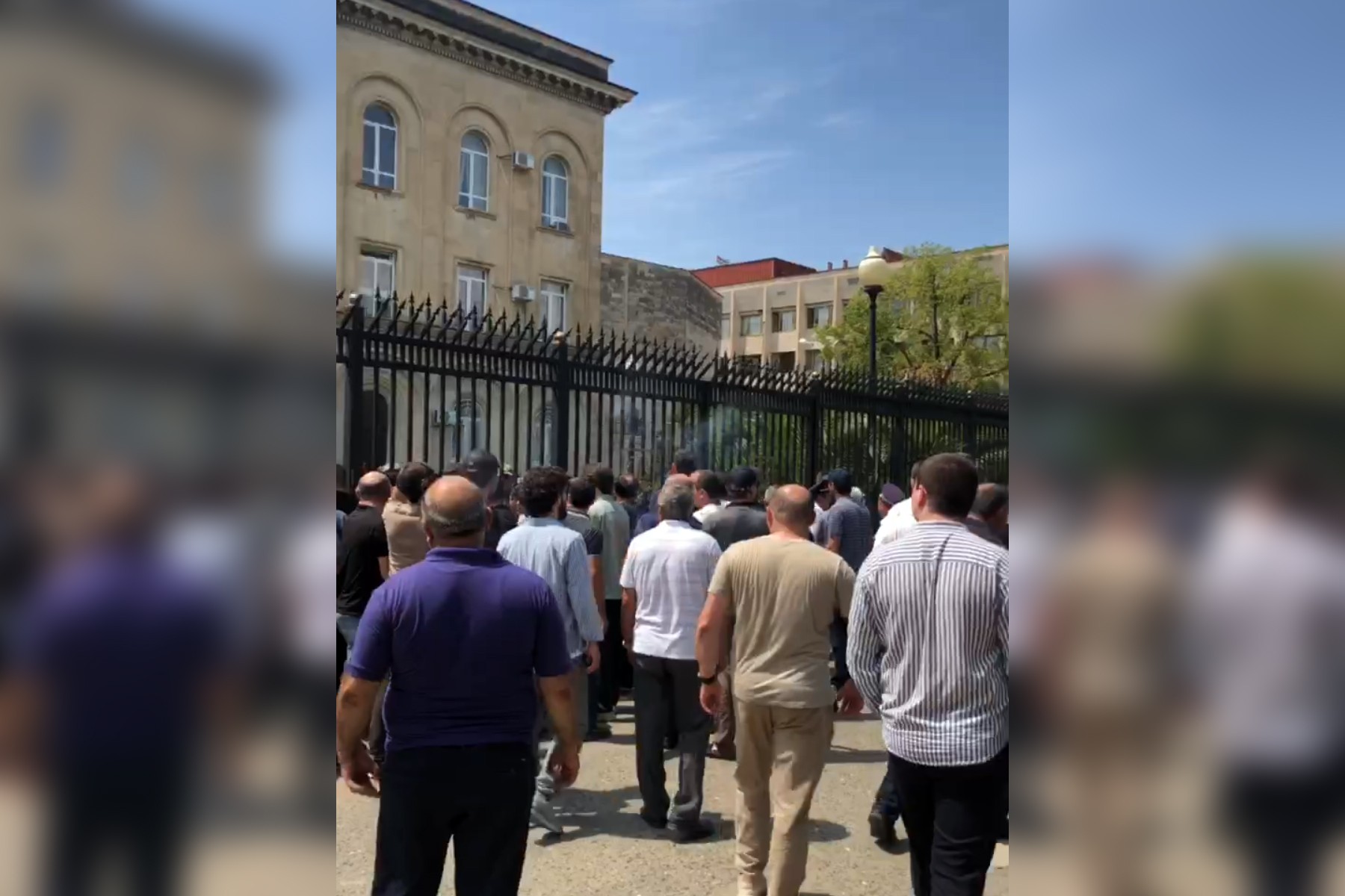 Protesters against  the draft Apart-Hotels Law outside Abkhazia’s parliament on 17 July. Image: OC Media. 