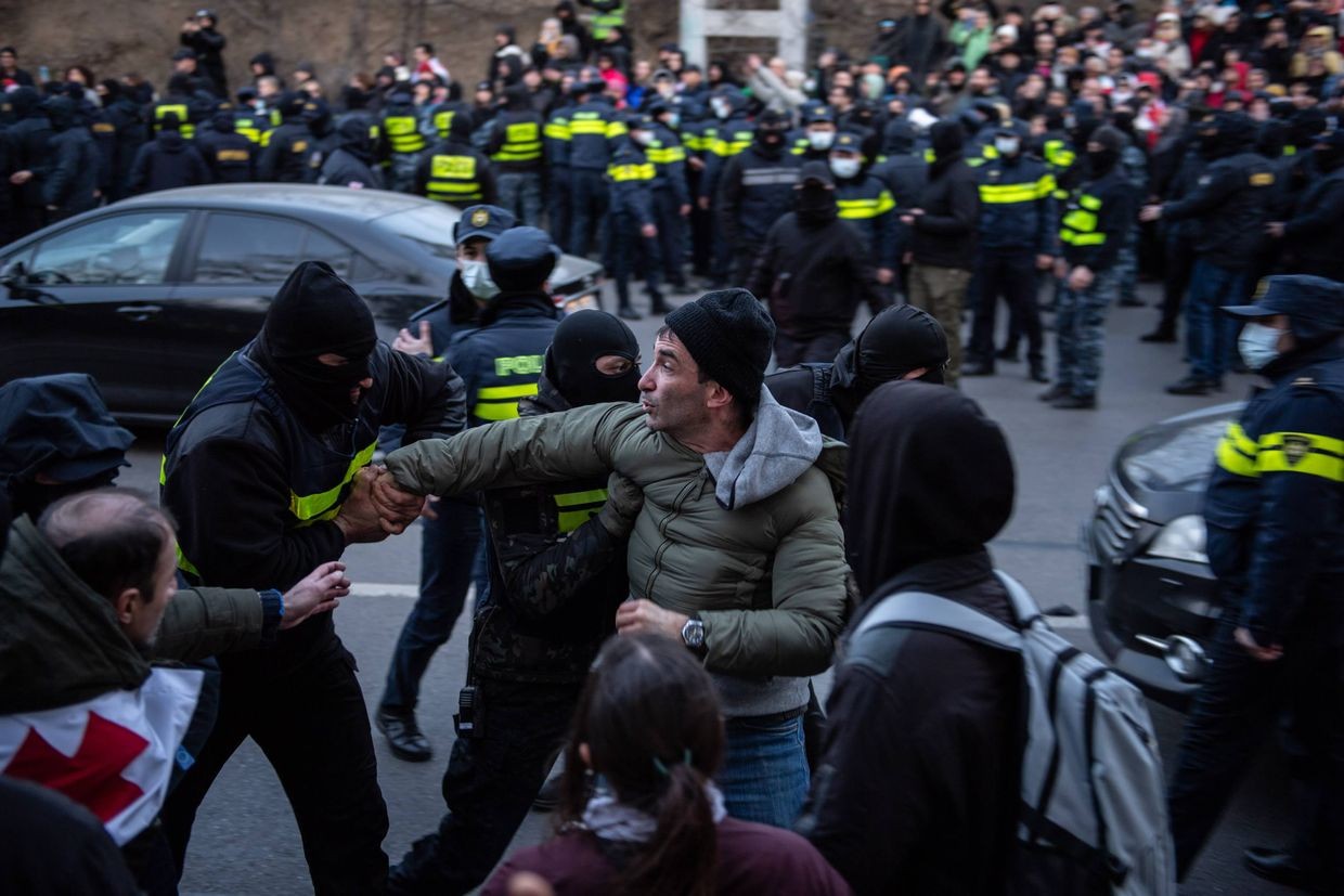 Police detaining a demonstrator during protest to block entrance to Tbilisi. Photo: Mariam Nikuradze/OC Media