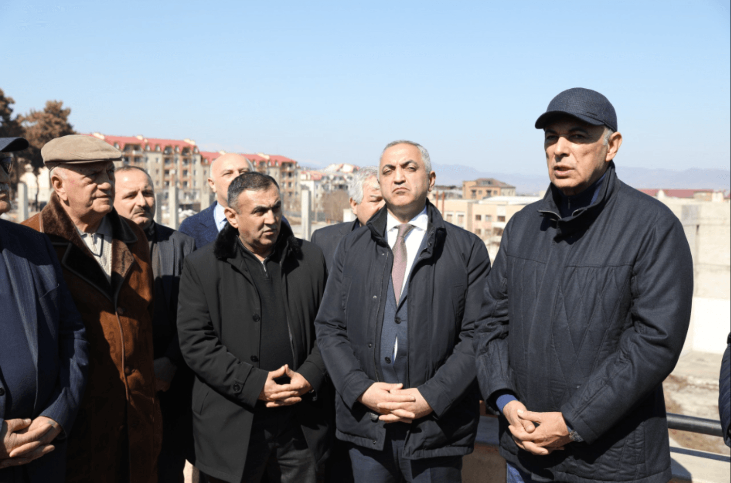 Adalat Valiyev (left) accompanying a group of Azerbaijani politicians on a tour in Nagorno-Karabakh. Photo: Azertac.