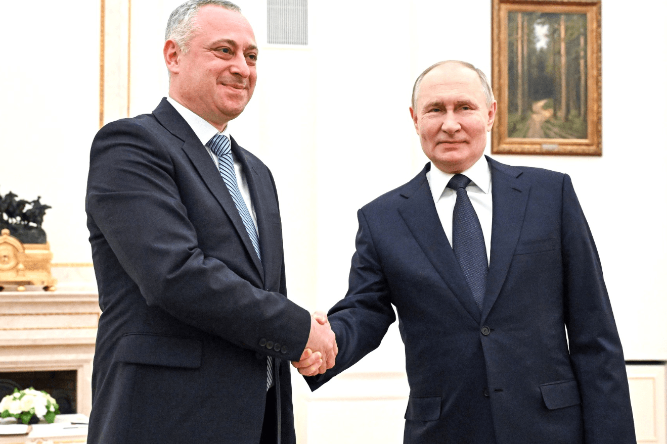 Abkhazian President-elect Badra Gunba shaking hands with Russian President Vladimir Putin during a visit to the Kremlin in March 2025. Official image.