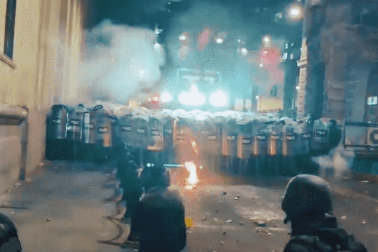 A clash scene in Tbilisi, which Recep Tayyip Erdoğan portrayed as footage of unrest in Turkey. Photo: screengrab from Erdoğan’s video.