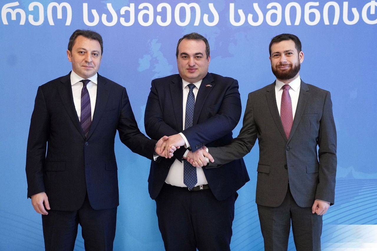 Azerbaijani Deputy Foreign Minister Elnur Mammadov (left), Georgian Deputy Foreign Minister Lasha Darsalia (middle), and Armenian Deputy Foreign Minister Vahan Kostanyan (right) shaking hands. Official photo.