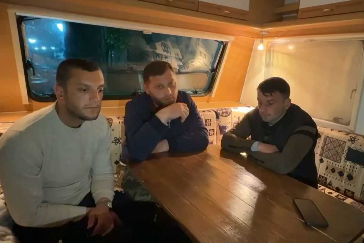 Simon Mikatsadze (left) and Merab Saralidze (middle). Screengrab from video.