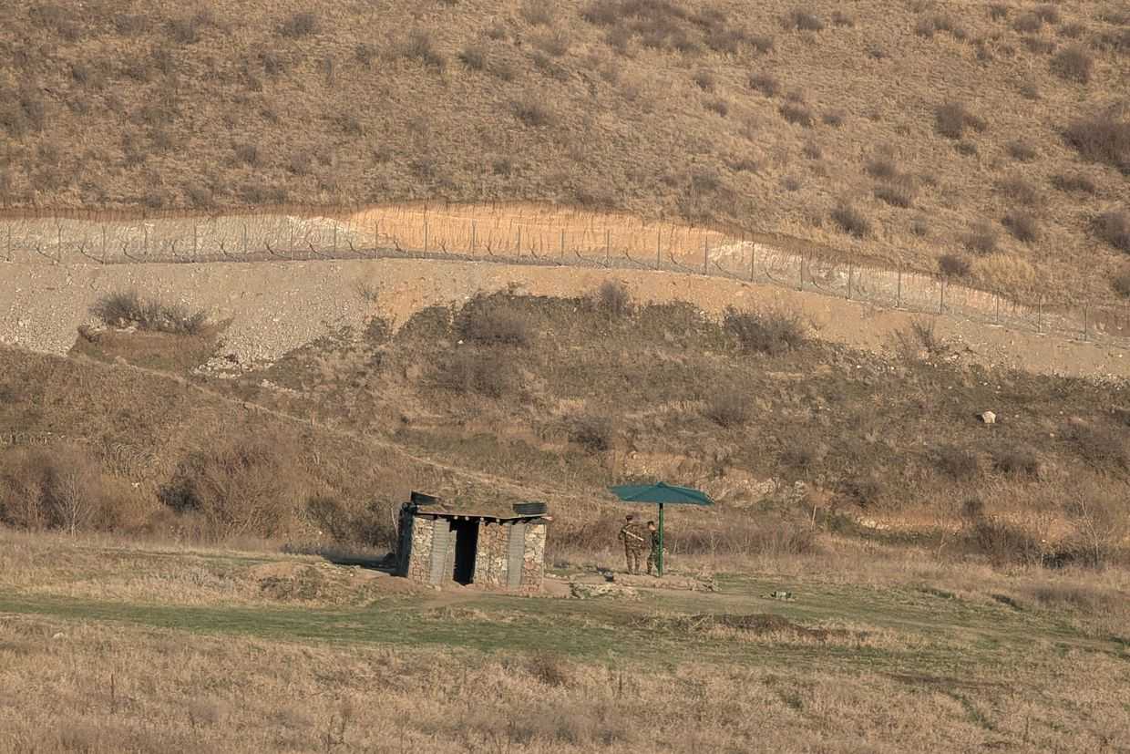 Armenian soldiers on a section of the Armenian–Azerbaijani border near Kirants. Photo: Basel Hindeleh/OC Media. For illustrative purposes.