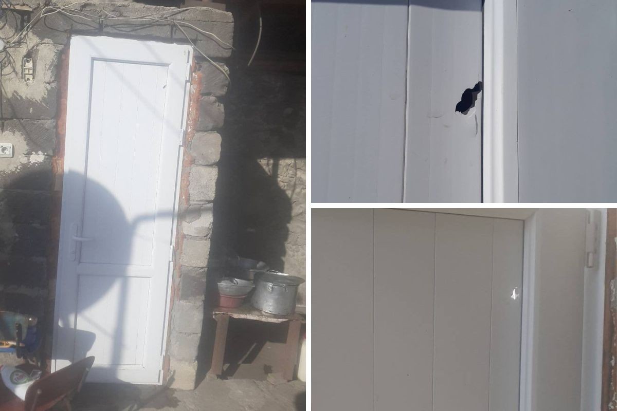 Damage sustained by a residential building’s door as a result of alleged Azerbaijani fire. Photo: Armenian Ministry of Defence.