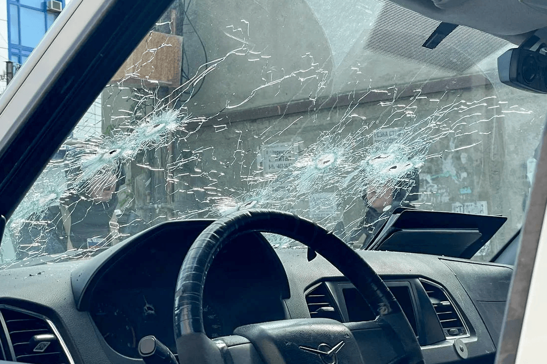 The windscreen of an attacked police car. Photo: TASS.