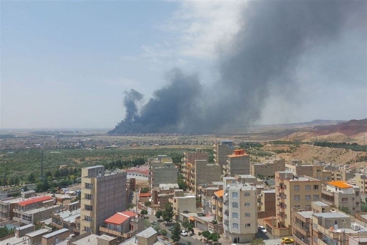 Smoke billows into the sky after an Israeli strike on a military airport outside Iran’s northwestern city of Tabriz on 13 June. Photo: Tasnim.