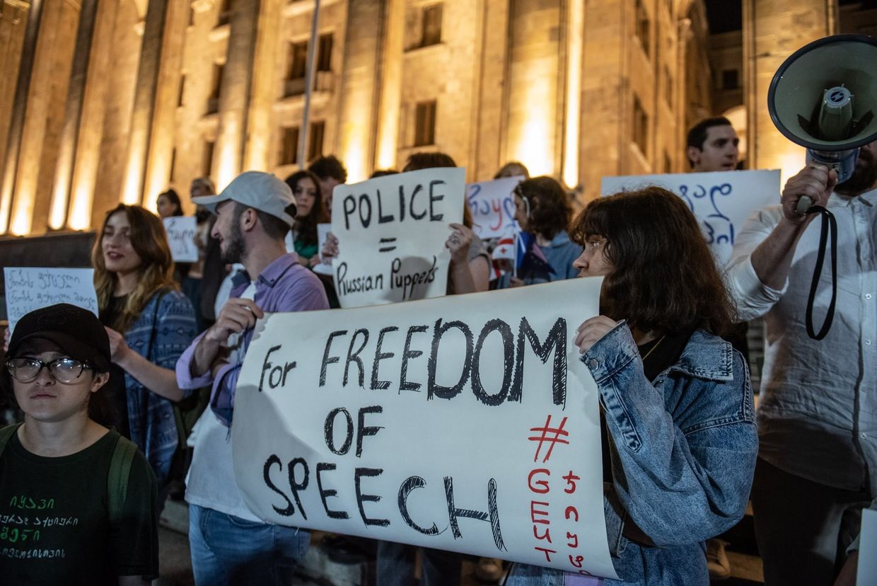 Protesters hold a sign defending freedom of speech in Tbilisi, June 2023. Photo: Mariam Nikuradze/OC Media.