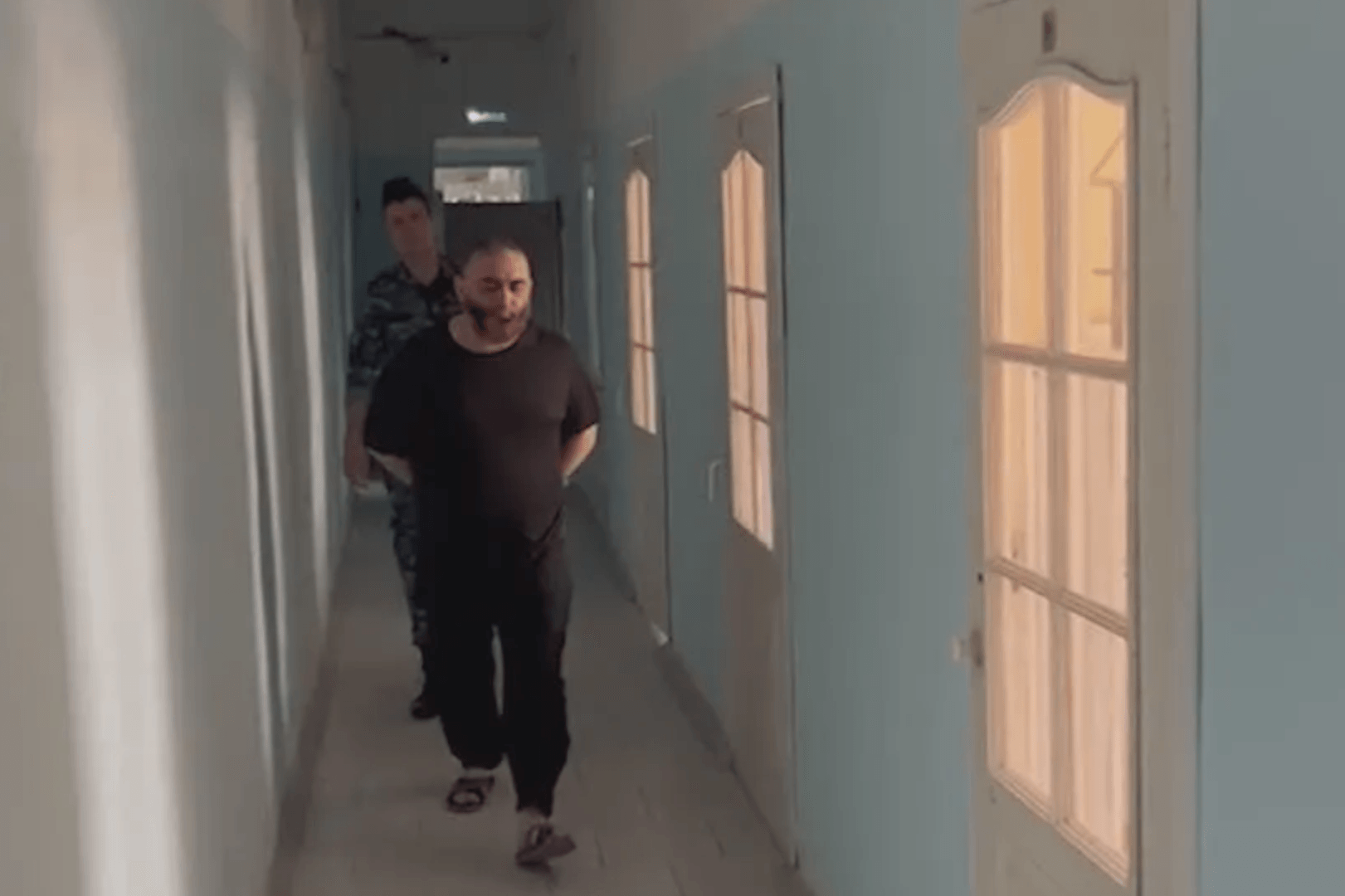 Anzor Batyrov coming to the court. Screengrab from video.