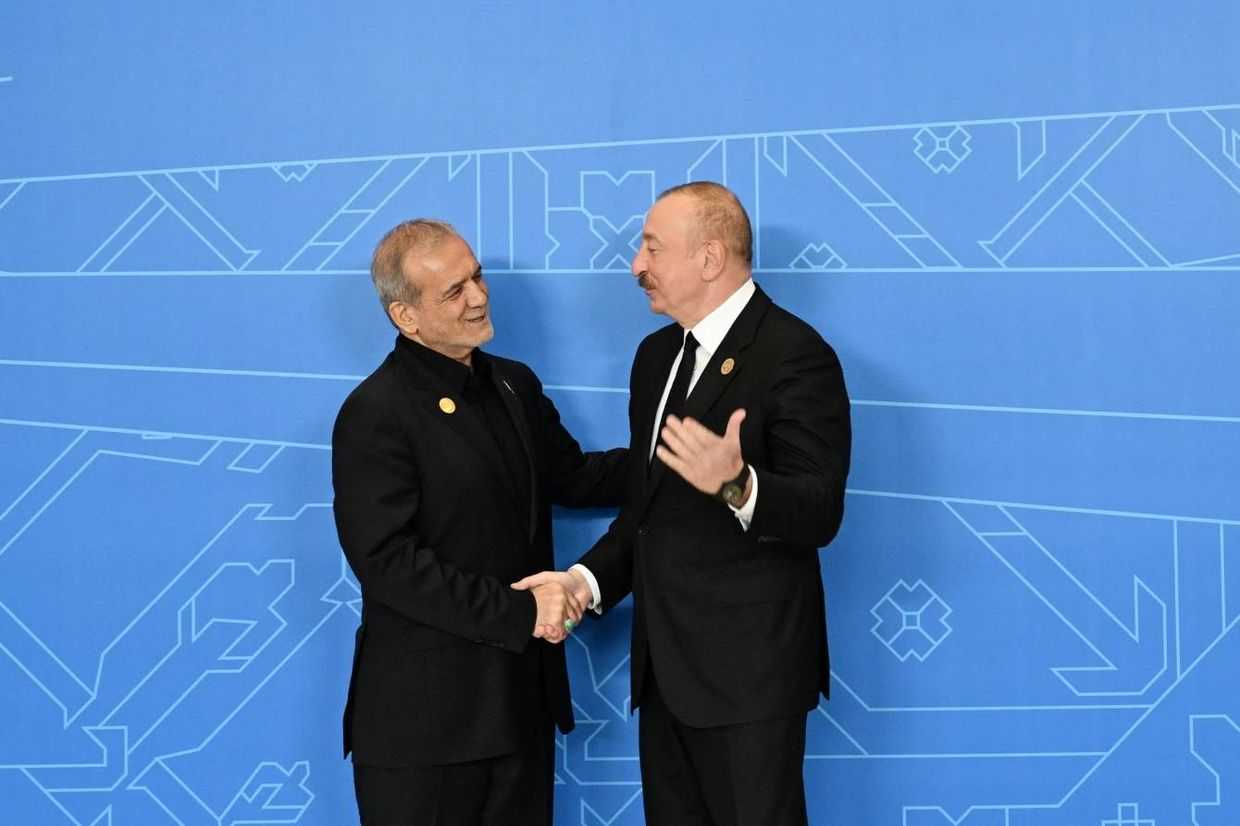 Iranian President Masoud Pezeshkian (left) and Azerbaijani President Ilham Aliyev (right) at the ECO conference on 4 July 2025. Official photo.