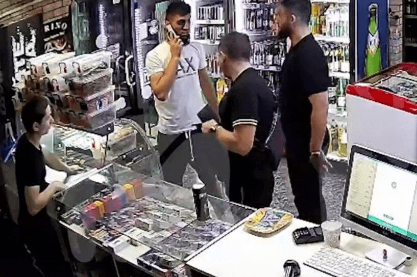 The incident in the store. Screengrab from video.