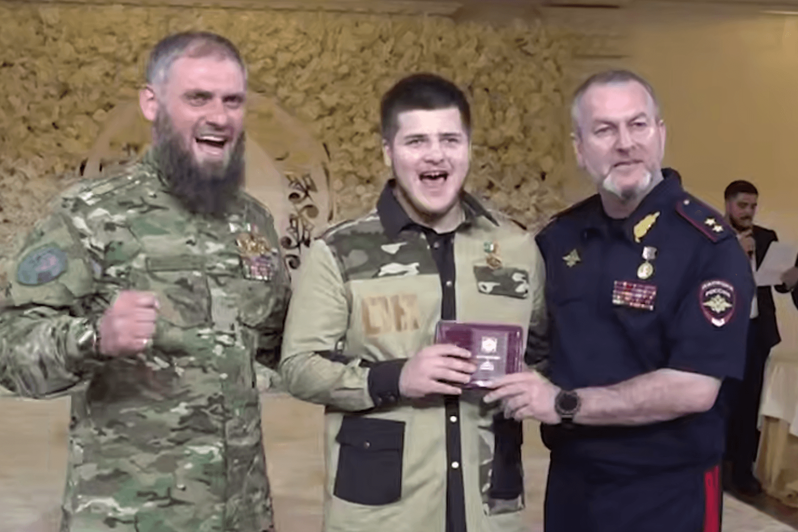 Adam Kadyrov is receiving the medal. Screengrab from video