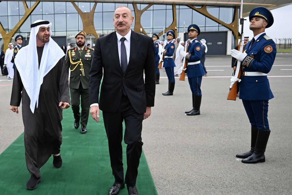 UAE President Sheikh Mohamed bin Zayed Al Nahyan (left) looks to Azerbaijan President Ilham Aliyev (centre). Official photo.