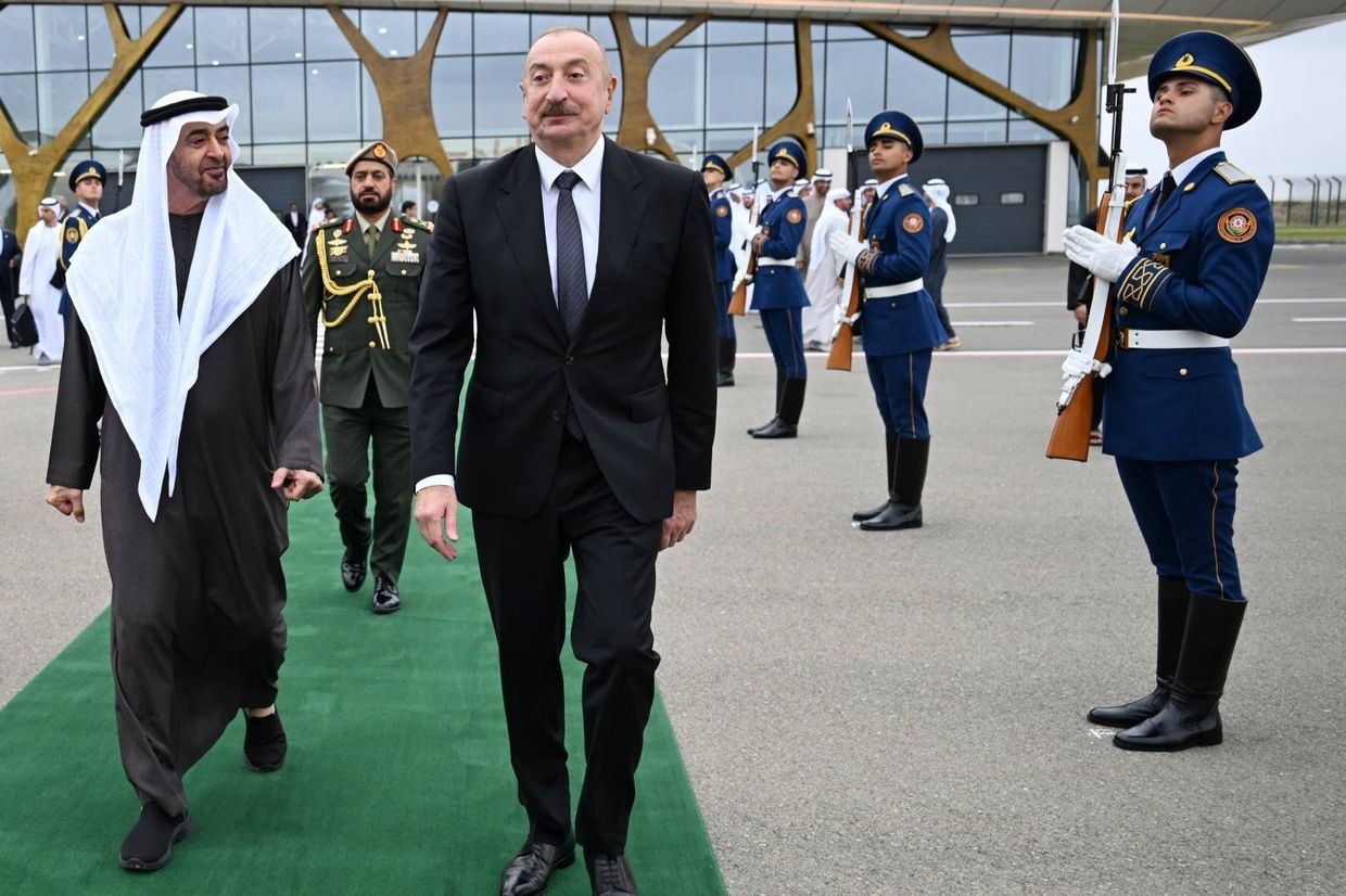 UAE President Sheikh Mohamed bin Zayed Al Nahyan (left) looks to Azerbaijan President Ilham Aliyev (centre). Official photo.