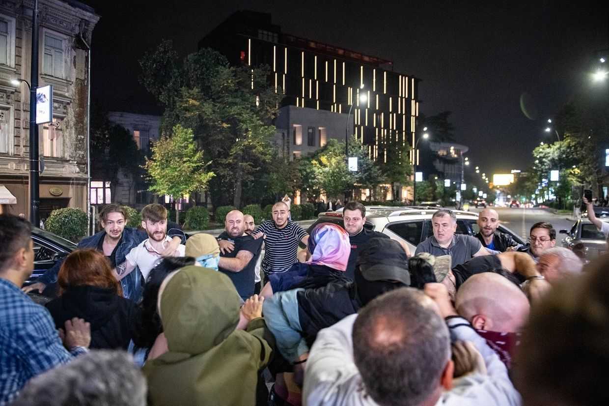 Georgian Dream supporters clash with protesters outside of the election HQ of the party in Tbilisi on 8 September 2025. Photo: Mariam Nikuradze/OC Media.