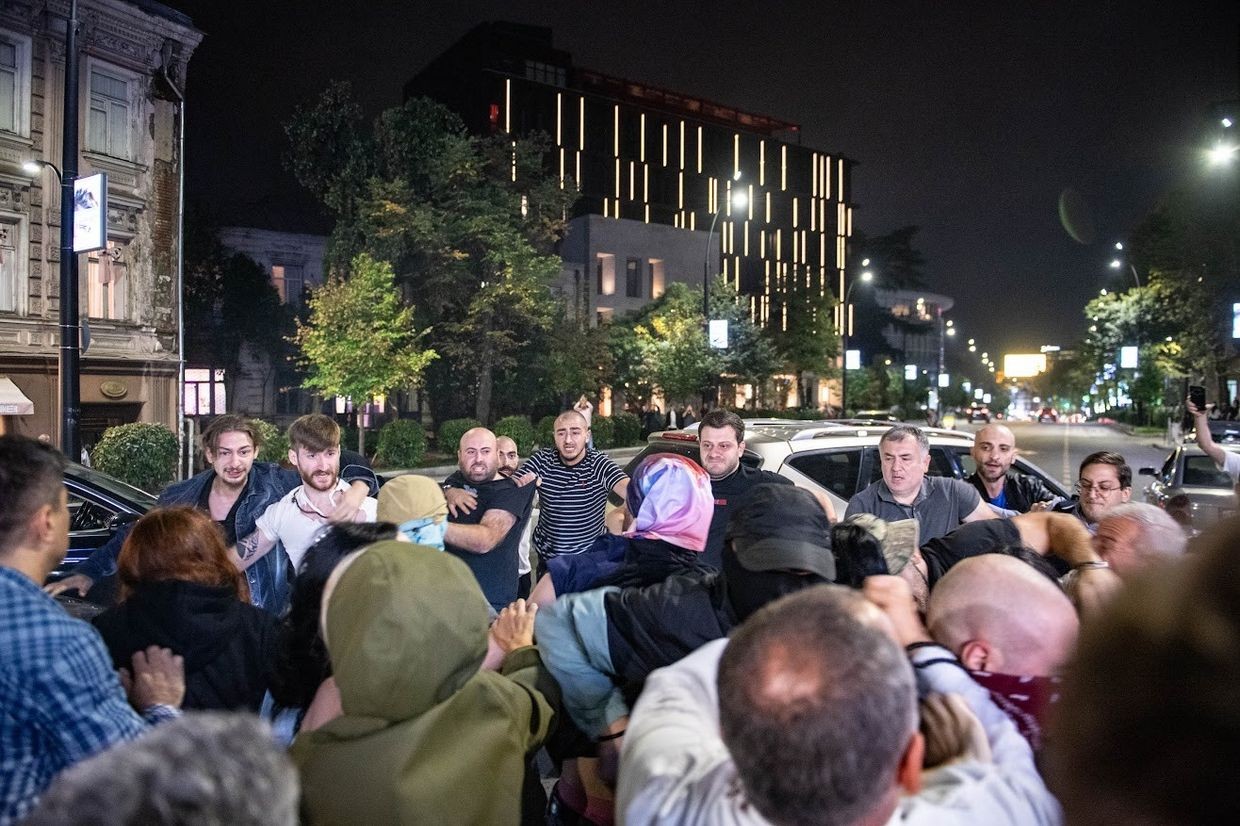 Georgian Dream supporters clash with protesters outside of the election HQ of the party in Tbilisi on 8 September 2025. Photo: Mariam Nikuradze/OC Media.
