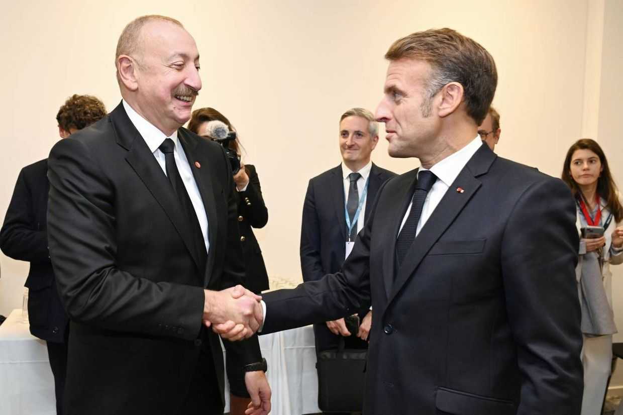 Azerbaijani President Ilham Aliyev (left) and French President Emmanuel Macron (right) speaking in Copenhagen in October 2025. Official photo.