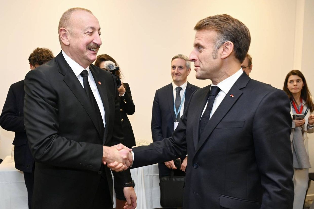 Azerbaijani President Ilham Aliyev (left) and French President Emmanuel Macron (right) speaking in Copenhagen in October 2025. Official photo.