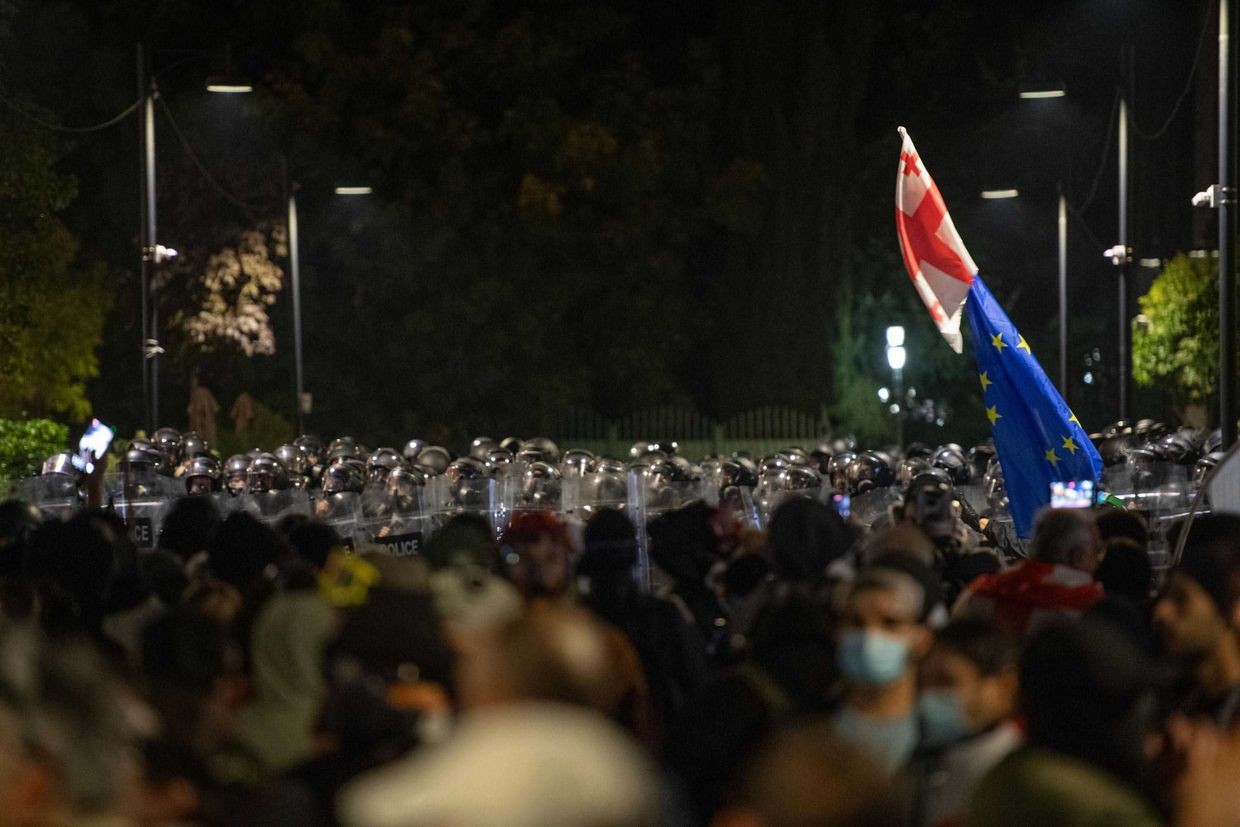Protesters and police face off in Tbilisi on 4 October. Photo: Mariam Nikuradze/OC Media.