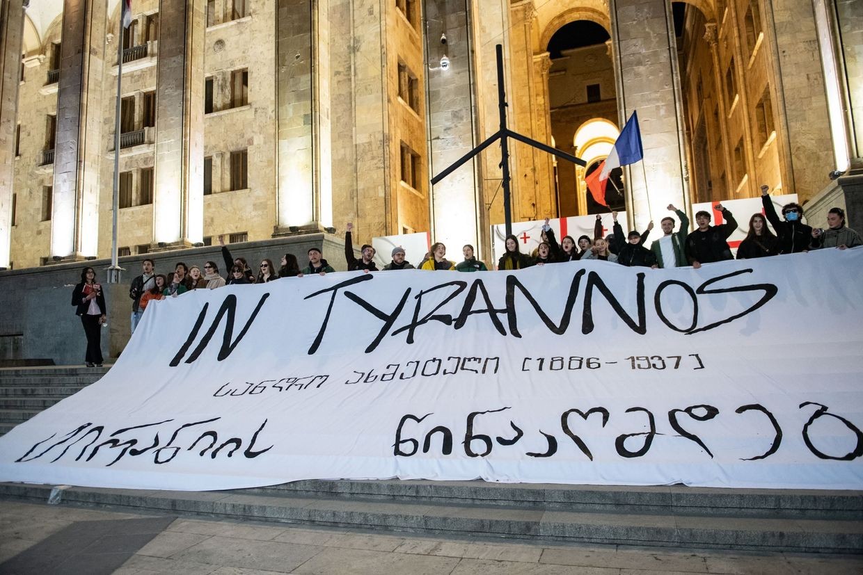 Protesters mark Georgian Theatre Day with a banner referencing the Georgian theatre director Sandro Akhmeteli who was killed in 1937 during the Soviet purge. Photo: Mariam Nikuradze/OC Media.