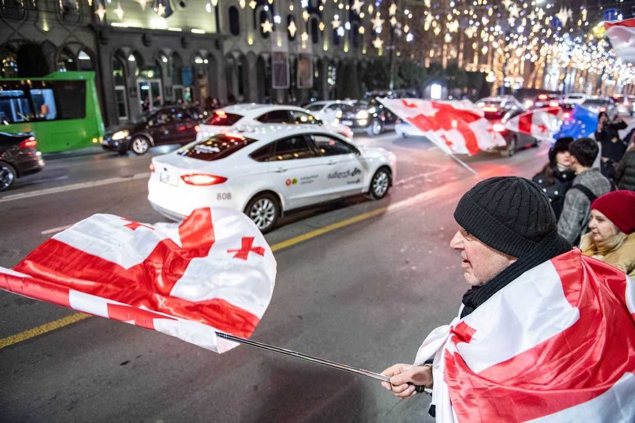Anti-government protest outside parliament on the evening of 17 December. Photo: Mariam Nikuradze/OC Media. 