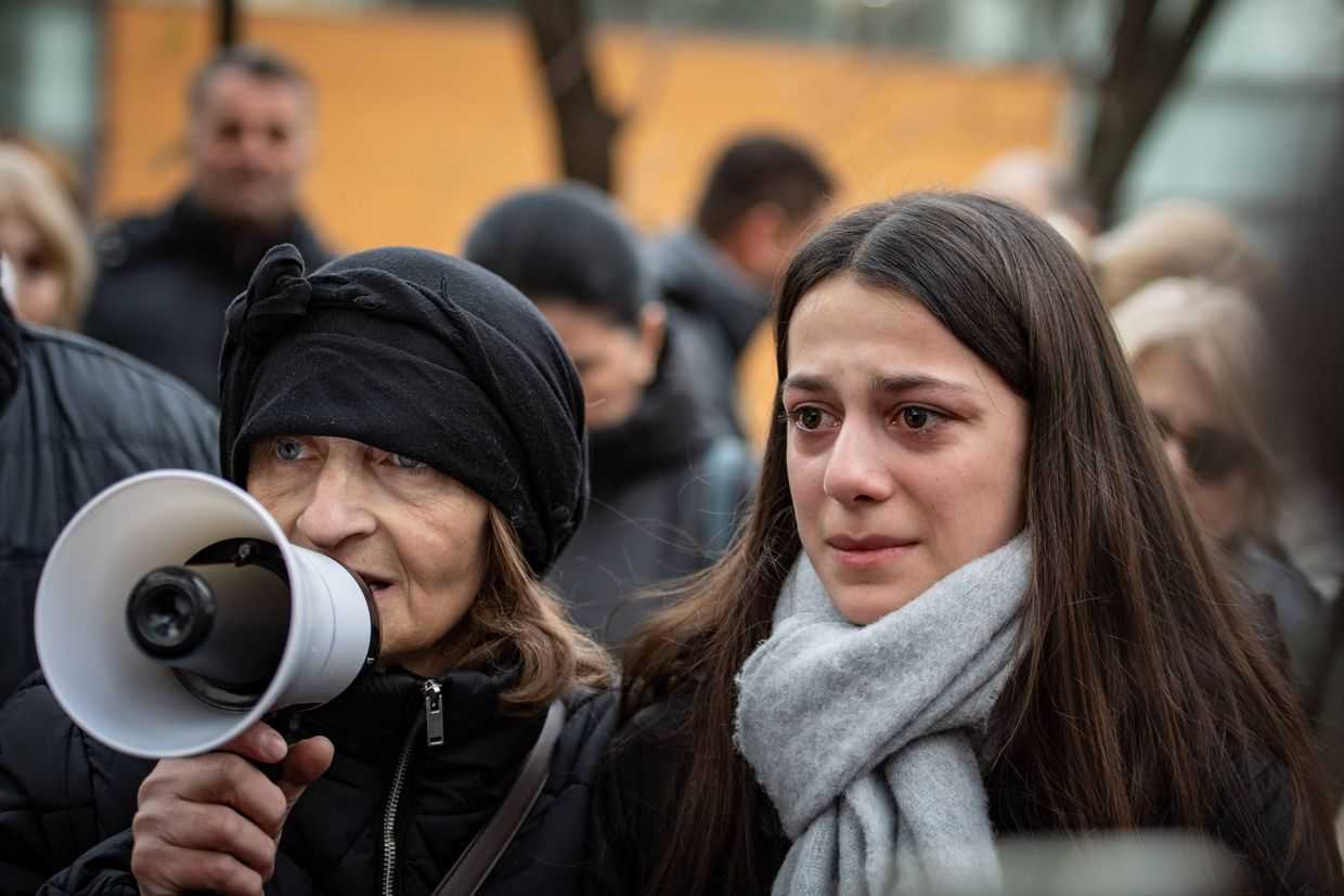 Eka Kupatadze (left) during a protest demanding an effective investigation into her son, Giga Avaliani's, death. Mariam Nikuradze/OC Media.
