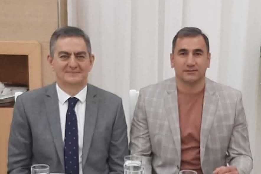 Popular Front Party chair Ali Karimli (left) and bodyguard Novruz Taghiyev. Photo via social media.
