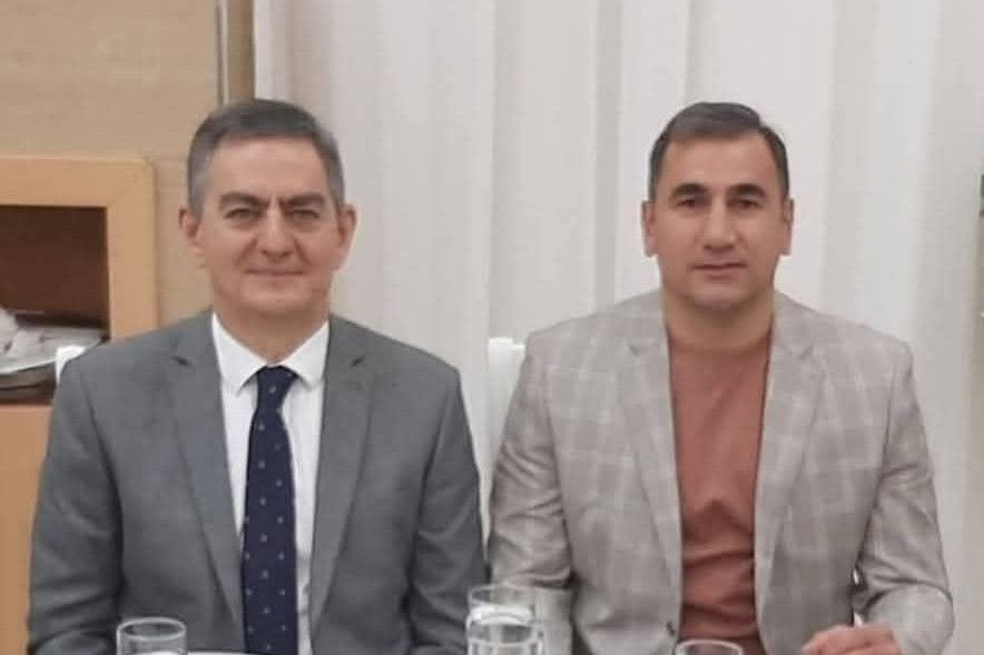Popular Front Party chair Ali Karimli (left) and bodyguard Novruz Taghiyev. Photo via social media.