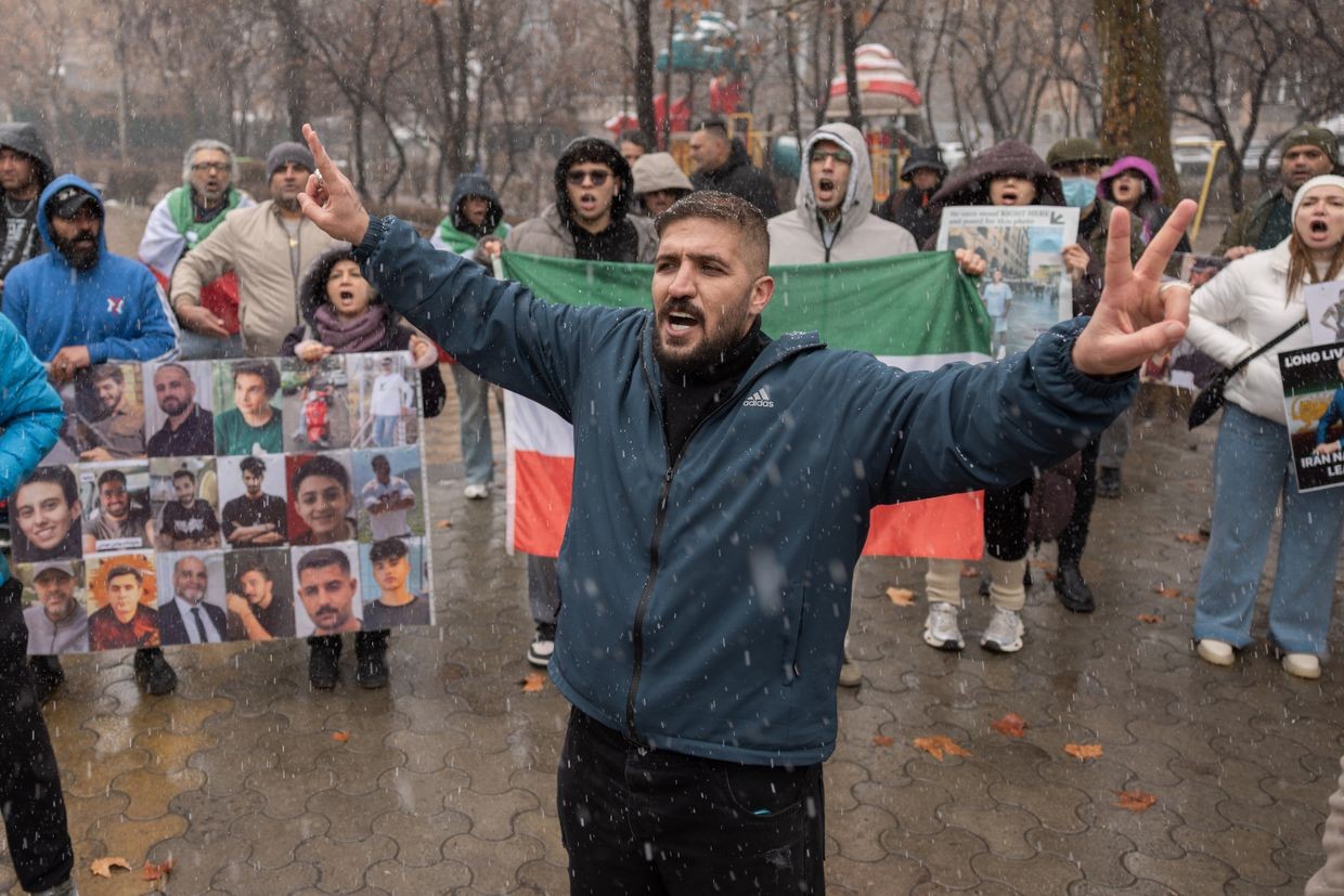 Iranian people attend a demonstration in support of the U.S. and Israeli strikes on Iran in front of Iranian Embassy in Yerevan, Armenia on 28 February 2026. (AP Photo/Anthony Pizzoferrato).