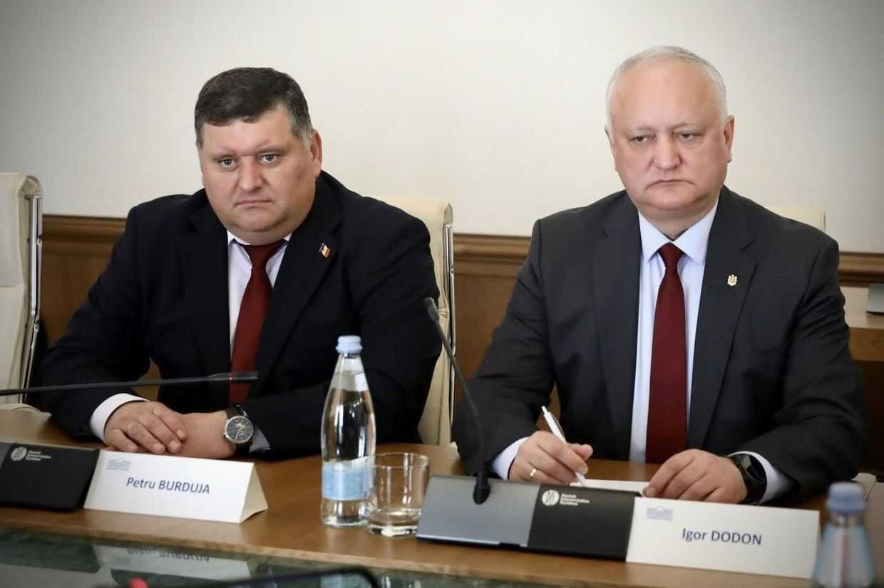 Petru Burduja, MP from PSRM (left) and Igor Dodon, former President of Moldova and PSRM leader (right) in the Georgian Parliament. 2 April 2026. Photo via social media. 
