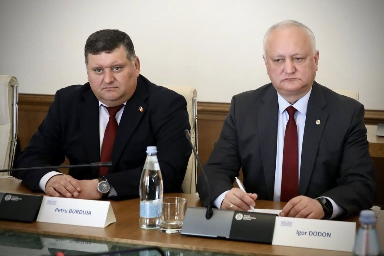 Petru Burduja, MP from PSRM (left) and Igor Dodon, former President of Moldova and PSRM leader (right) in the Georgian Parliament. 2 April 2026. Photo via social media. 