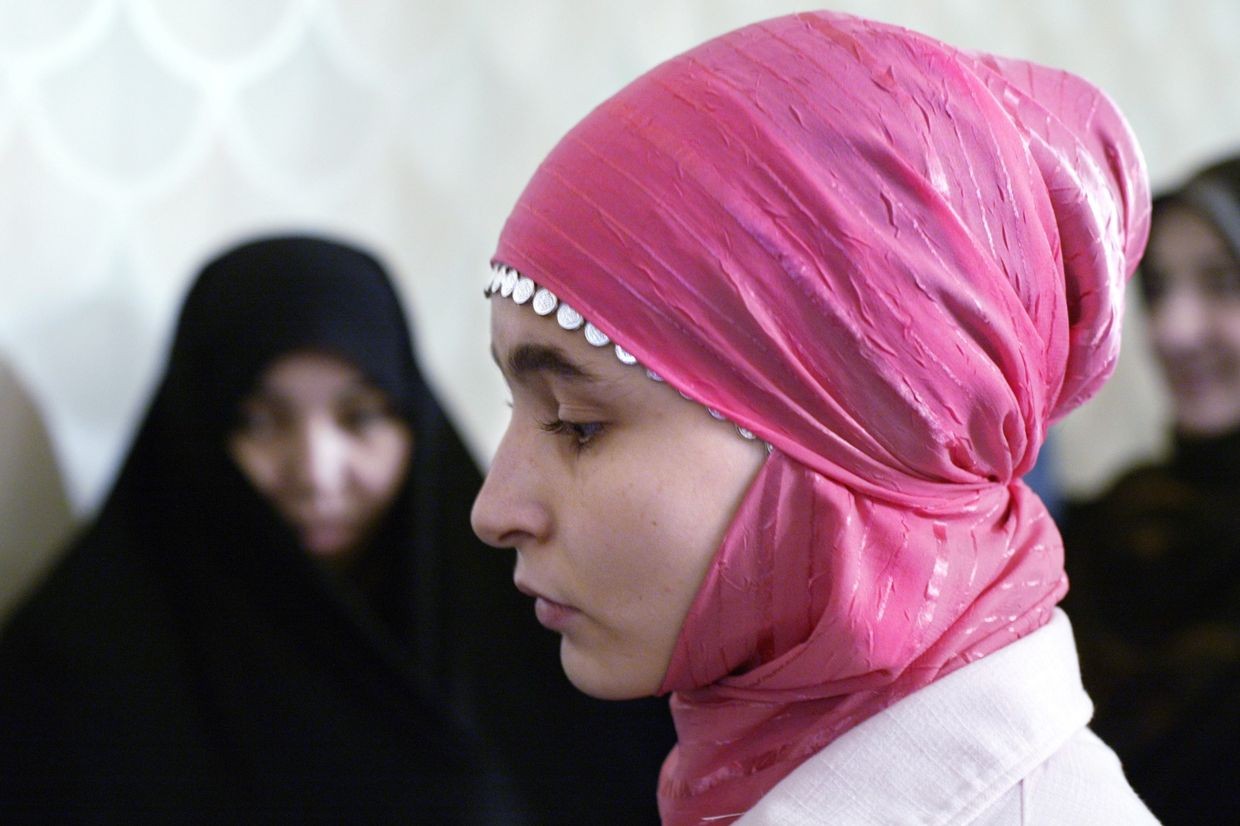 An Azerbaijani girl wearing hijab. Illustrative photo: AP Photo/Misha Japaridze.