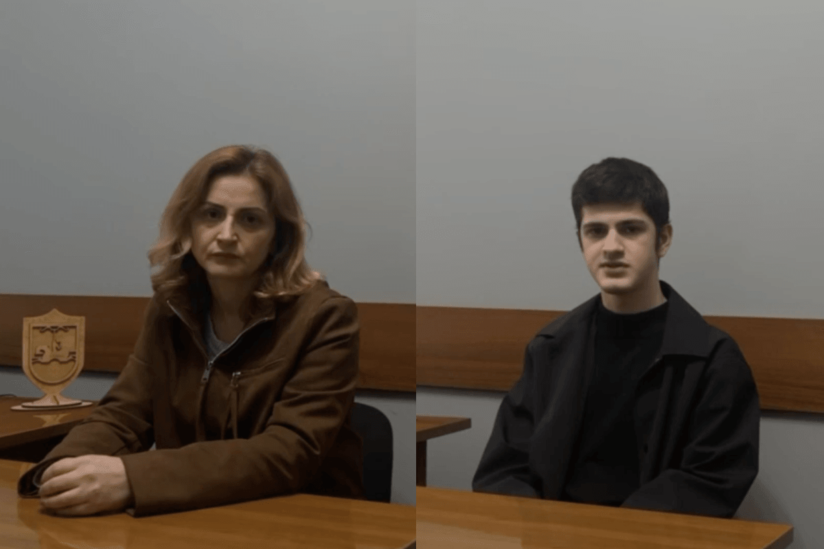 Nina Bronik and her son Timur Ugurov being interrogated by the authorities in Abkhazia. Screengrab via official video.