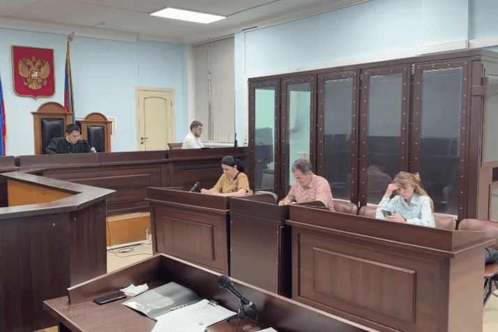 The Supreme Court of Daghestan sentencing three people in absentia on 2 April 2026 for allegedly organising the Makhachkala airport riots of October 2023. Screengrab from official video.