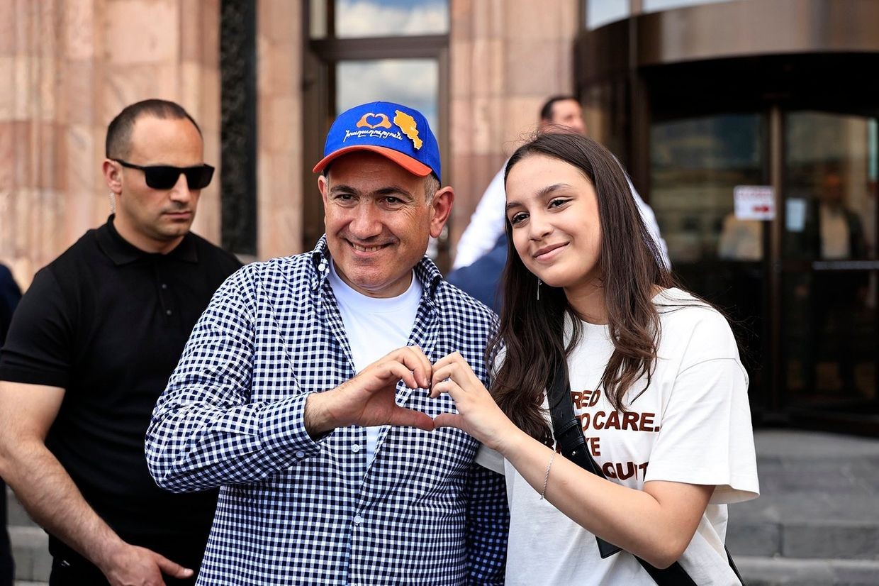 Armenian Prime Minister Nikol Pashinyan making his infamous hand-heart gesture while campaigning ahead of the June 2026 parliamentary elections. Photo via social media.