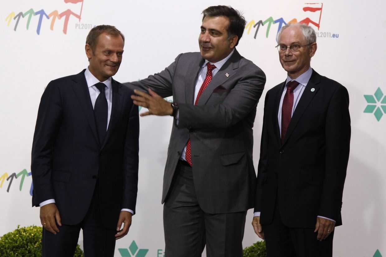 From left to Right: Poland’s Prime Minister Donald Tusk, then-Georgian President Mikheil Saakashvili and then-European Council President Herman Van Rompuy, at the Copernicus Science Center in Warsaw in 2011. Photo: AP/Virginia Mayo.