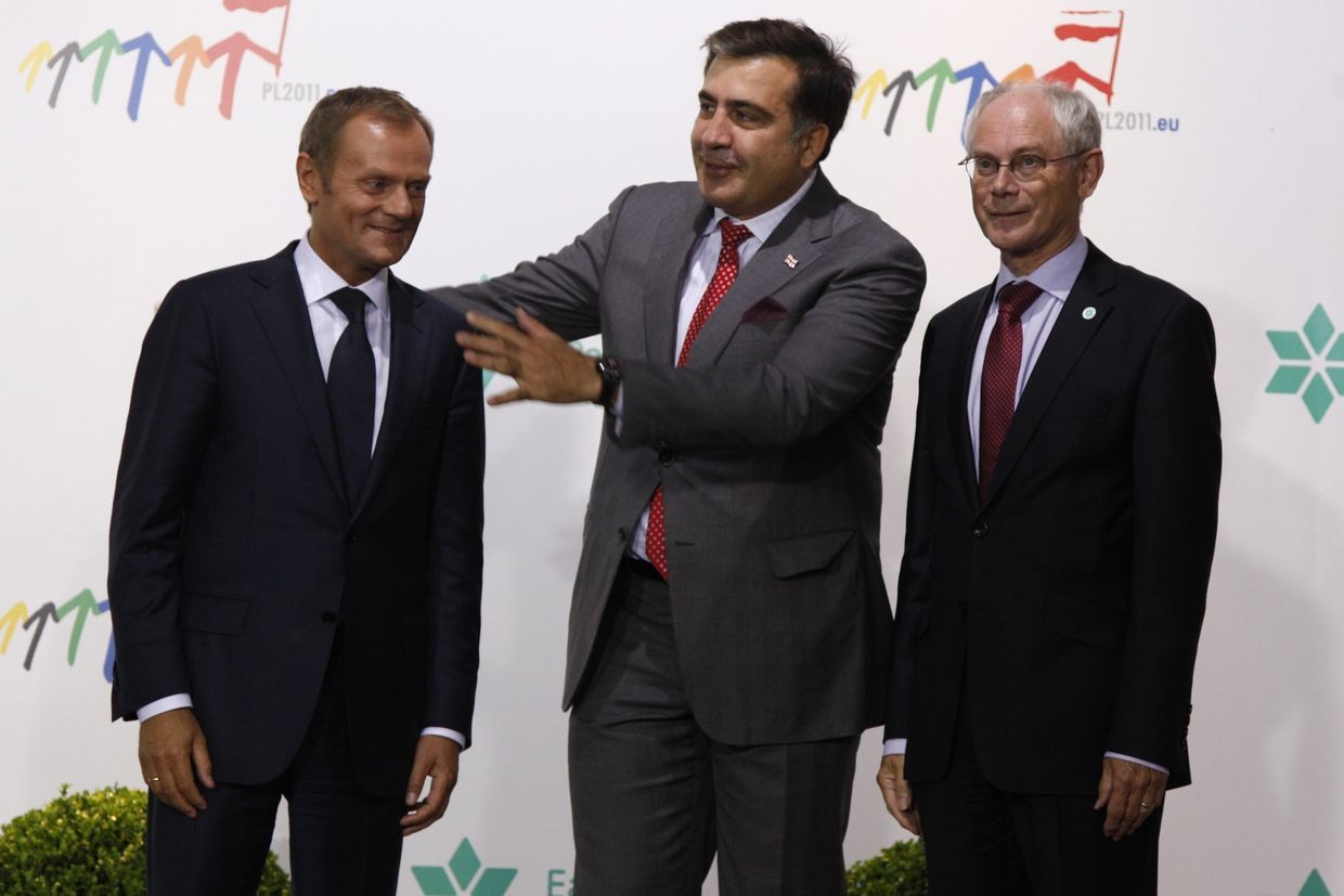 From left to Right: Poland’s Prime Minister Donald Tusk, then-Georgian President Mikheil Saakashvili and then-European Council President Herman Van Rompuy, at the Copernicus Science Center in Warsaw in 2011. Photo: AP/Virginia Mayo.