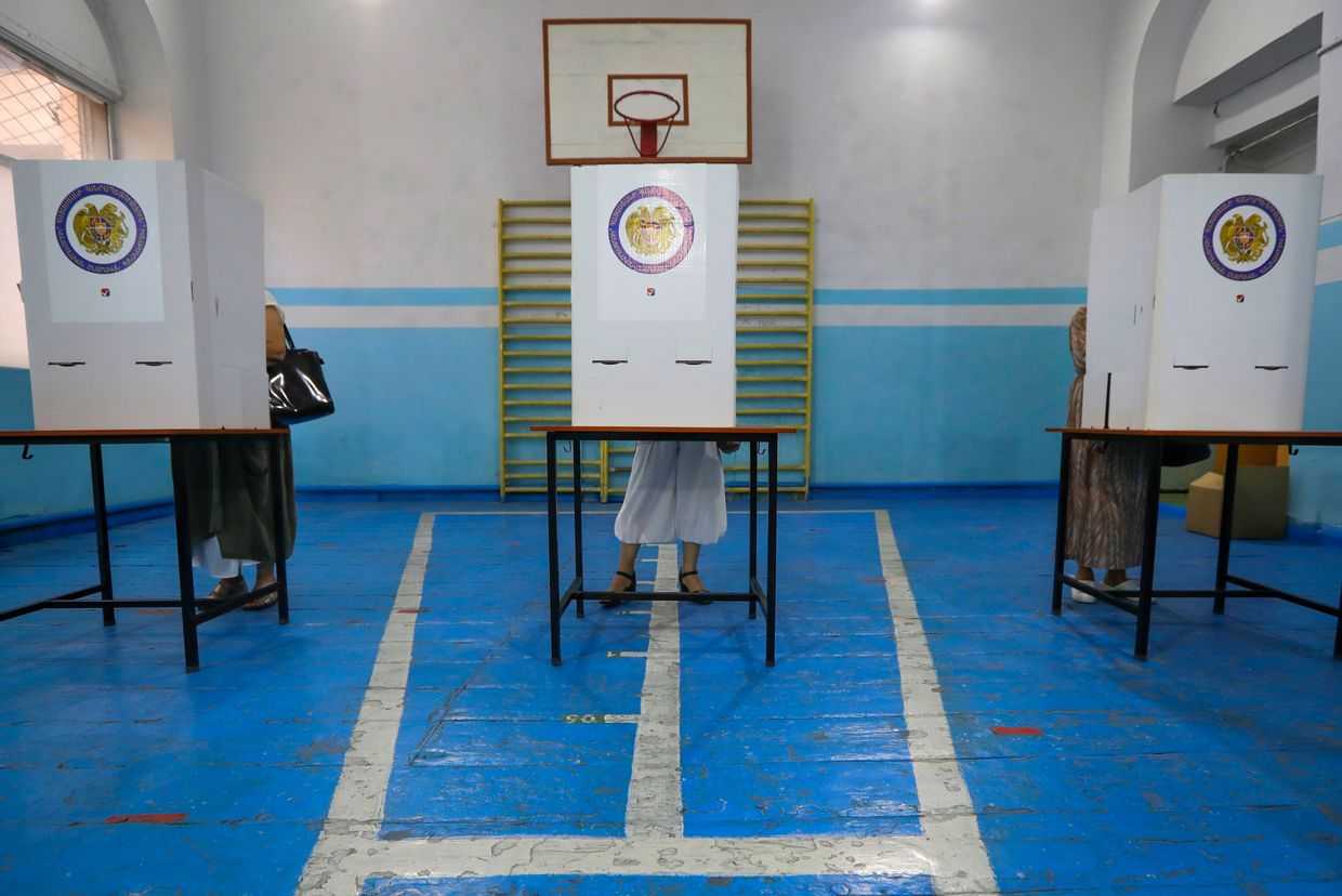 A polling station in Yerevan, Armenia during the snap 2021 parliamentary elections. Photo: AP Photo/Sergei Grits.