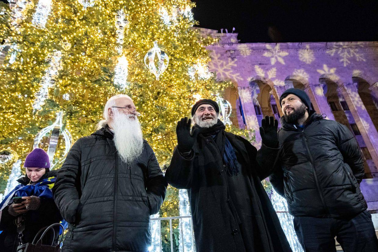 Georgia live updates | A subdued holiday spirit as protests continue