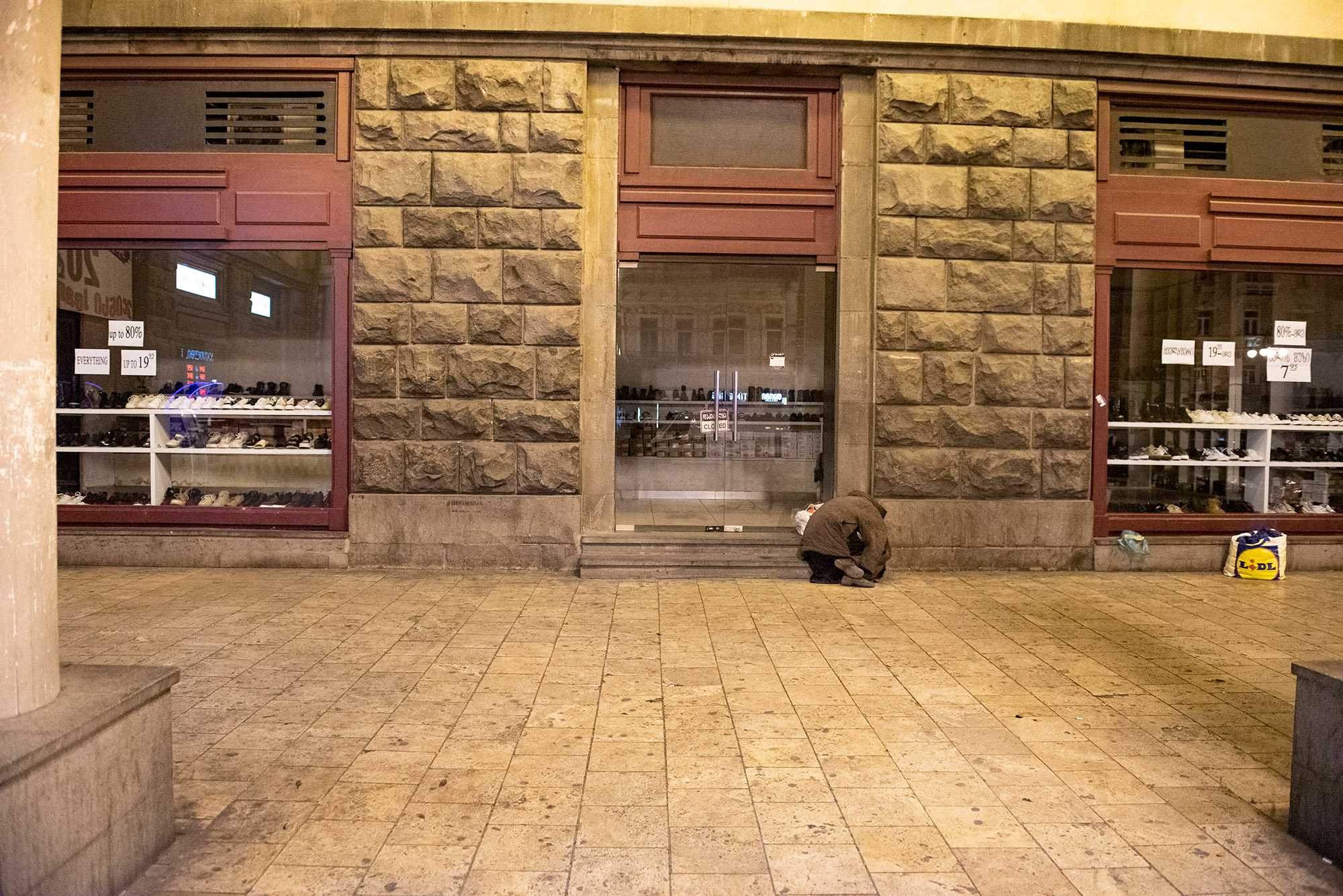 A person sleeping outside Tbilisi’s Marjanishvili Metro on 31 March after the curfew began. Photo: Mariam Nikuradze/OC Media.