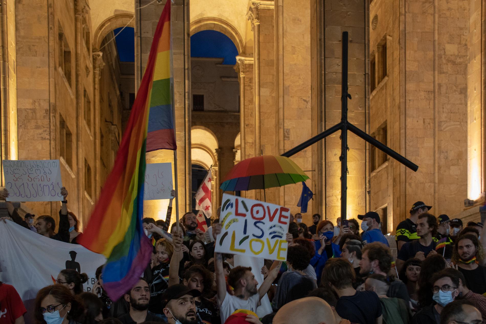 Queer activists protest homophobic attacks outside parliament in Tbilisi. 6 July 2021. Photo: Shota Kincha/OC Media.