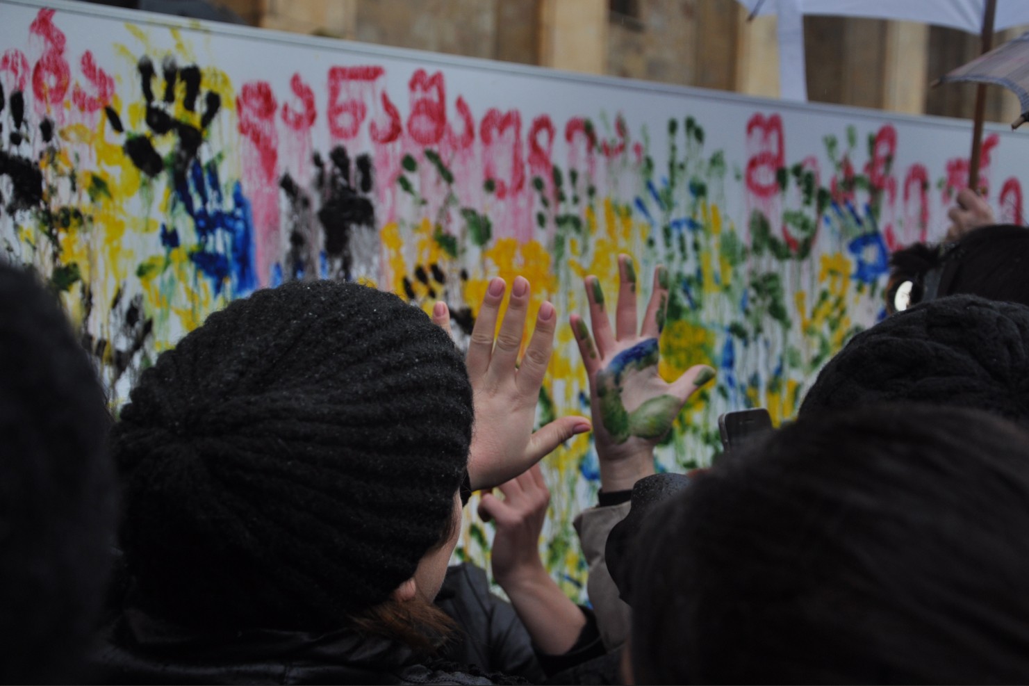 A demonstration against violence against women in Tbilisi Georgia. The wall says: ‘violence against women is a crime, stop it’.