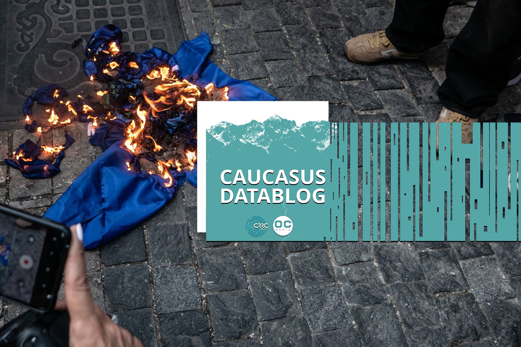 A NATO flag being burnt during a far-right demonstration in Tbilisi on 2 July 2022. Photo: Mariam Nikuradze/OC Media.